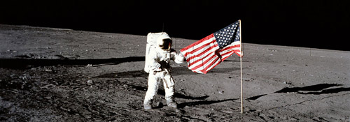 Astronaut on moon with flag